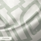 Abstract geometric pattern of interlocking gray rectangular shapes on beige background
