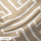 Greek key pattern in white on beige background with geometric maze-like design