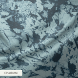 Dark blue floral lace pattern with delicate flowers and leaves on contrasting background