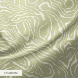 Abstract swirling pattern in white lines on sage green background, resembling flowing water or natur