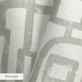 Abstract geometric pattern of interlocking gray rectangular shapes on beige background