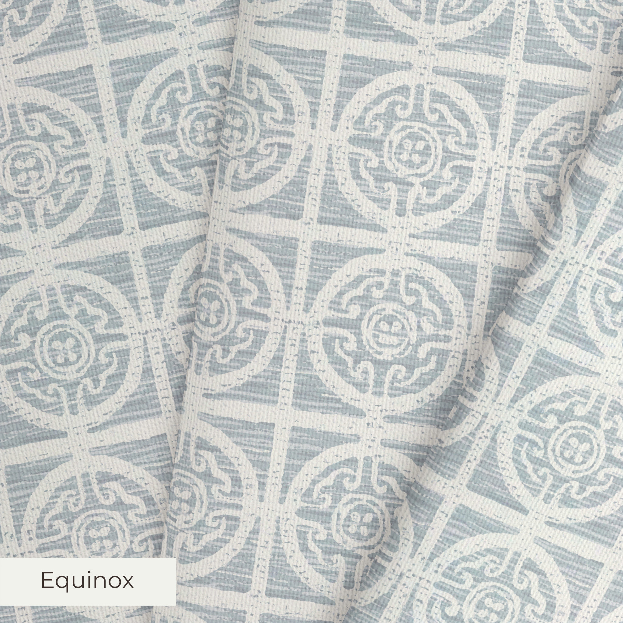 Geometric pattern with ornate circular medallions in gray and white, resembling vintage tile design