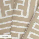 Greek key pattern in white on beige background with geometric maze-like design
