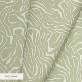 Abstract swirling pattern in white lines on sage green background, resembling flowing water or natur