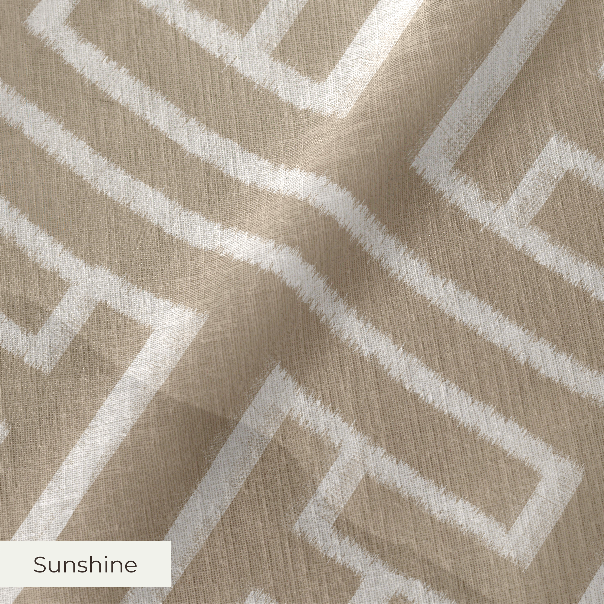 Greek key pattern in white on beige background with geometric maze-like design