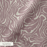 Swirling organic pattern in white lines on mauve-brown background creating flowing abstract texture