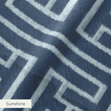 White geometric Greek key pattern on dark blue background