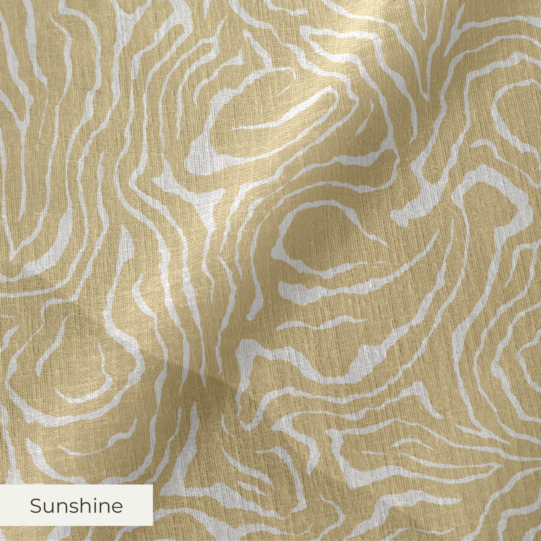 Gold and white swirling abstract pattern with flowing organic lines resembling wood grain or marbled