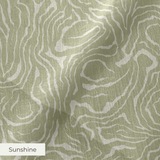 Abstract swirling pattern in white lines on sage green background, resembling flowing water or natur