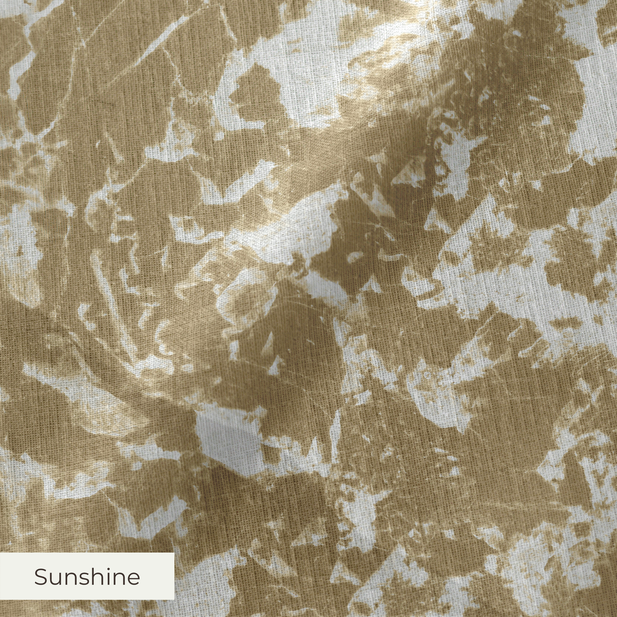 Abstract gold and white mottled pattern with organic shapes and speckled texture
