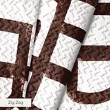 Abstract brown geometric maze pattern on white background with interlocking angular lines