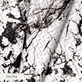 Abstract black and white speckled texture with irregular organic patterns and high contrast