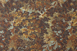 Autumn oak leaves and acorns in brown, gold, and sage green tones creating a dense fall foliage patt