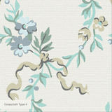 Delicate floral pattern with blue flowers, green leaves, and curved stems on light background
