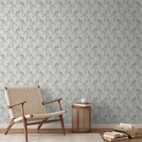 Delicate floral pattern with blue flowers, green leaves, and curved stems on light background
