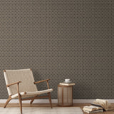 Ornate geometric pattern with dark circular medallions on beige textured background