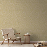 Gold and white swirling abstract pattern with flowing organic lines resembling wood grain or marbled