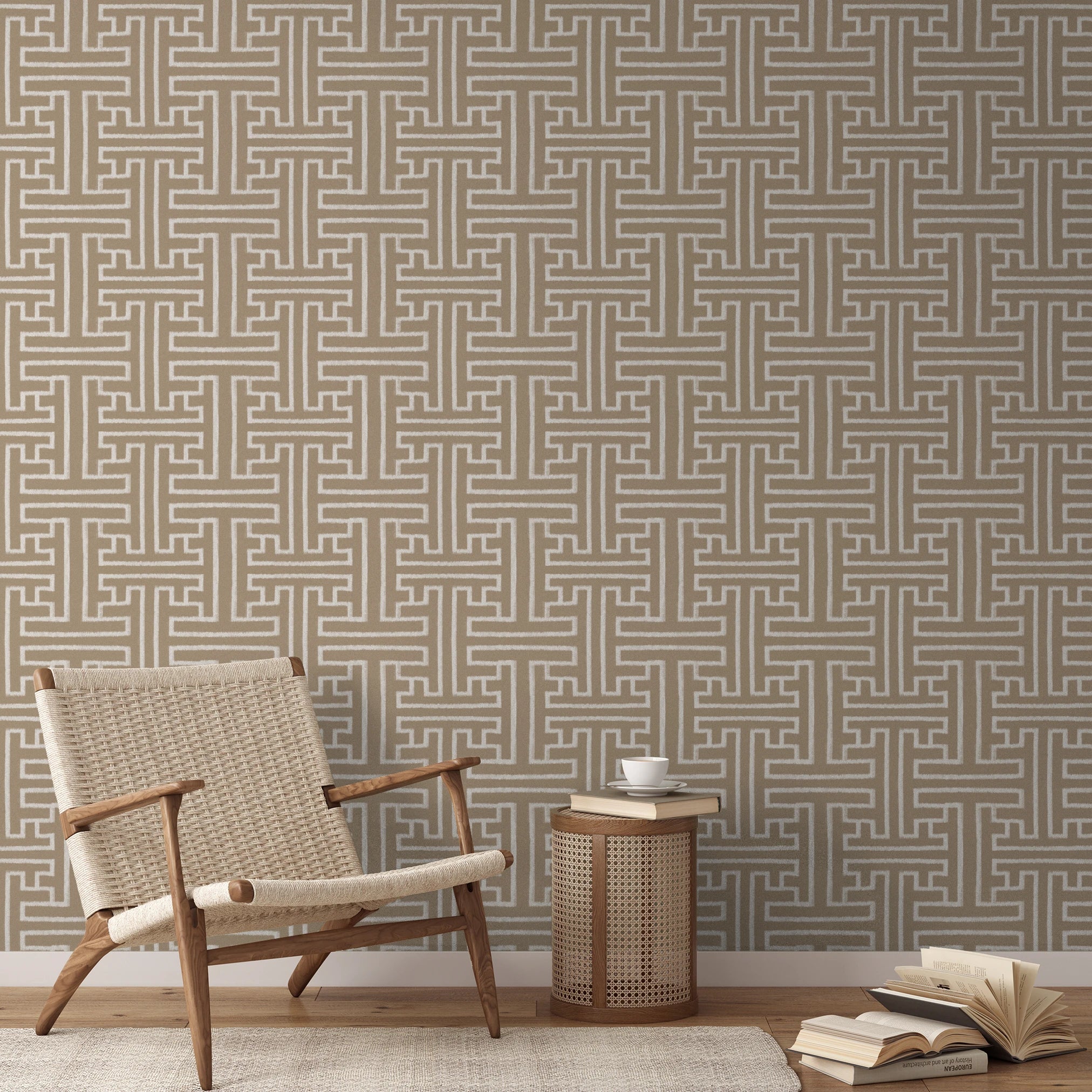 Greek key pattern in white on beige background with geometric maze-like design