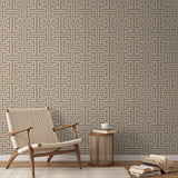 Greek key pattern in white on beige background with geometric maze-like design