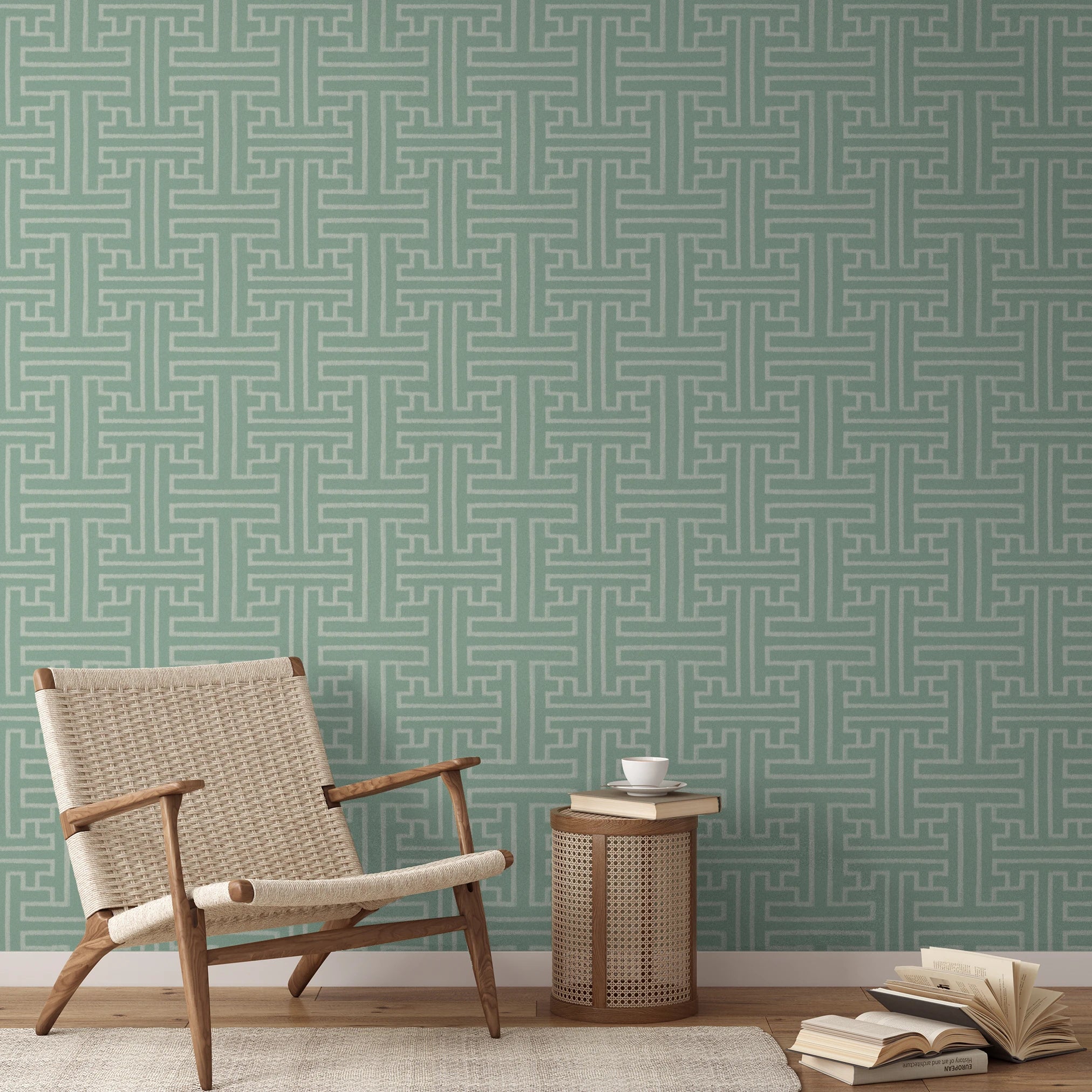 Greek key pattern in sage green and cream with geometric interlocking maze design
