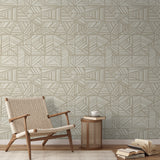 Geometric pattern with beige and cream angular lines forming abstract triangular shapes on light bac