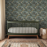 Vintage-style jungle scene with animals, plants, and flowers in muted blue, green, and gold tones