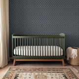 Dark gray repeating starburst pattern with white radiating lines forming geometric tiles