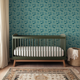 Whimsical folk art pattern with teapots, flowers, rabbits, and leaves in teal, sage, and cream tones