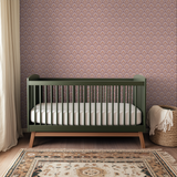 Ornate damask pattern in mauve, pink, and gold with symmetrical floral and foliate motifs