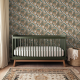 Abstract mid-century modern pattern with teal and gold curved lines, starburst motifs, and geometric