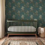 Pastoral toile pattern with trees and figures in cream and brown on teal background