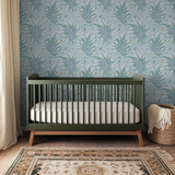 Delicate botanical pattern with teal and white fern fronds and golden butterflies on light blue back