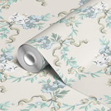 Delicate floral pattern with blue flowers, green leaves, and curved stems on light background