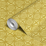 Ornate gold geometric tile pattern with circular medallions and decorative Greek key motifs