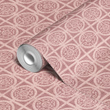 Vintage pink and cream ornate tile pattern with circular medallions and geometric details