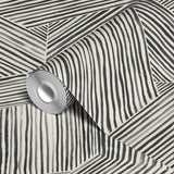 Abstract geometric pattern of intersecting black line segments forming angular shapes on white backg