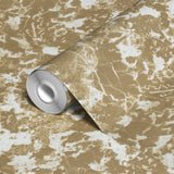 Abstract gold and white mottled pattern with organic shapes and speckled texture