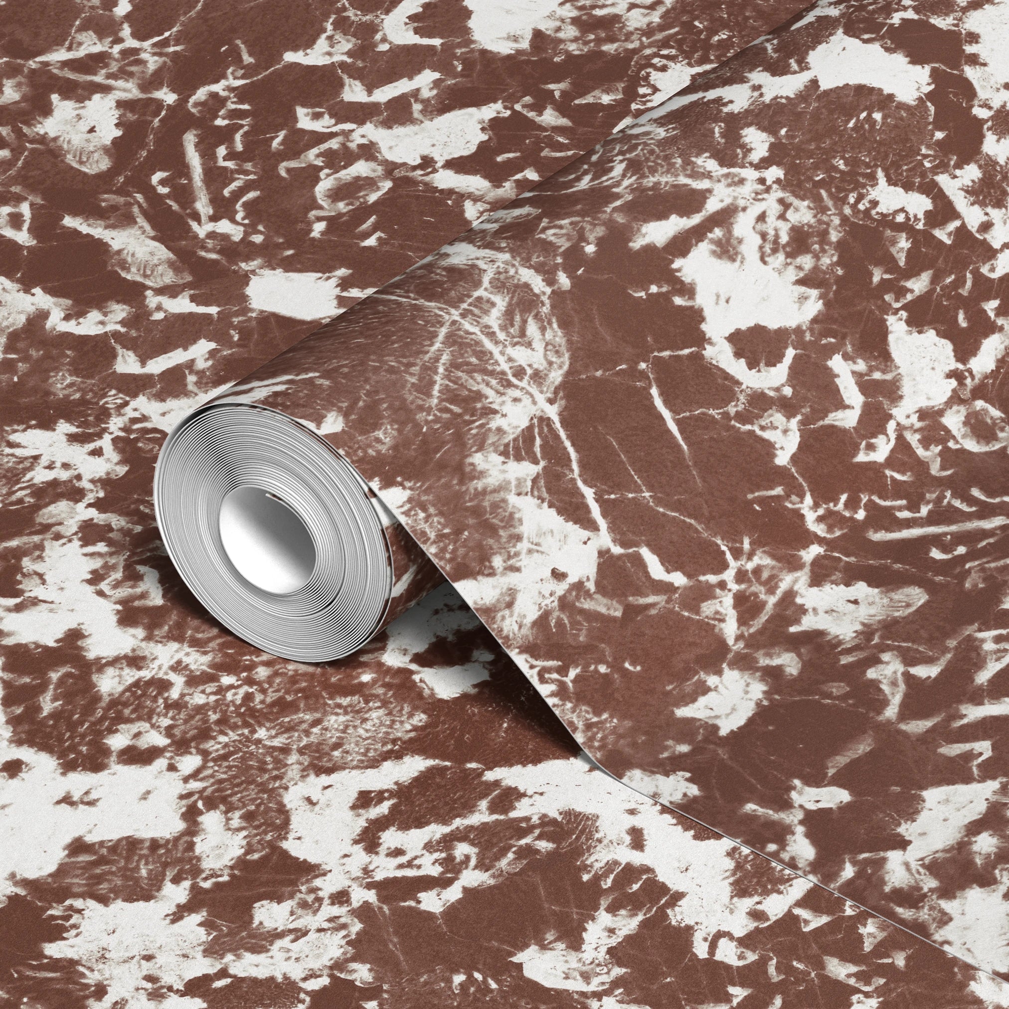 Brown and white speckled pattern with irregular organic shapes creating a mottled texture