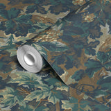 Dark floral wallpaper pattern with gold, cream, and teal leaves and flowers on navy blue background