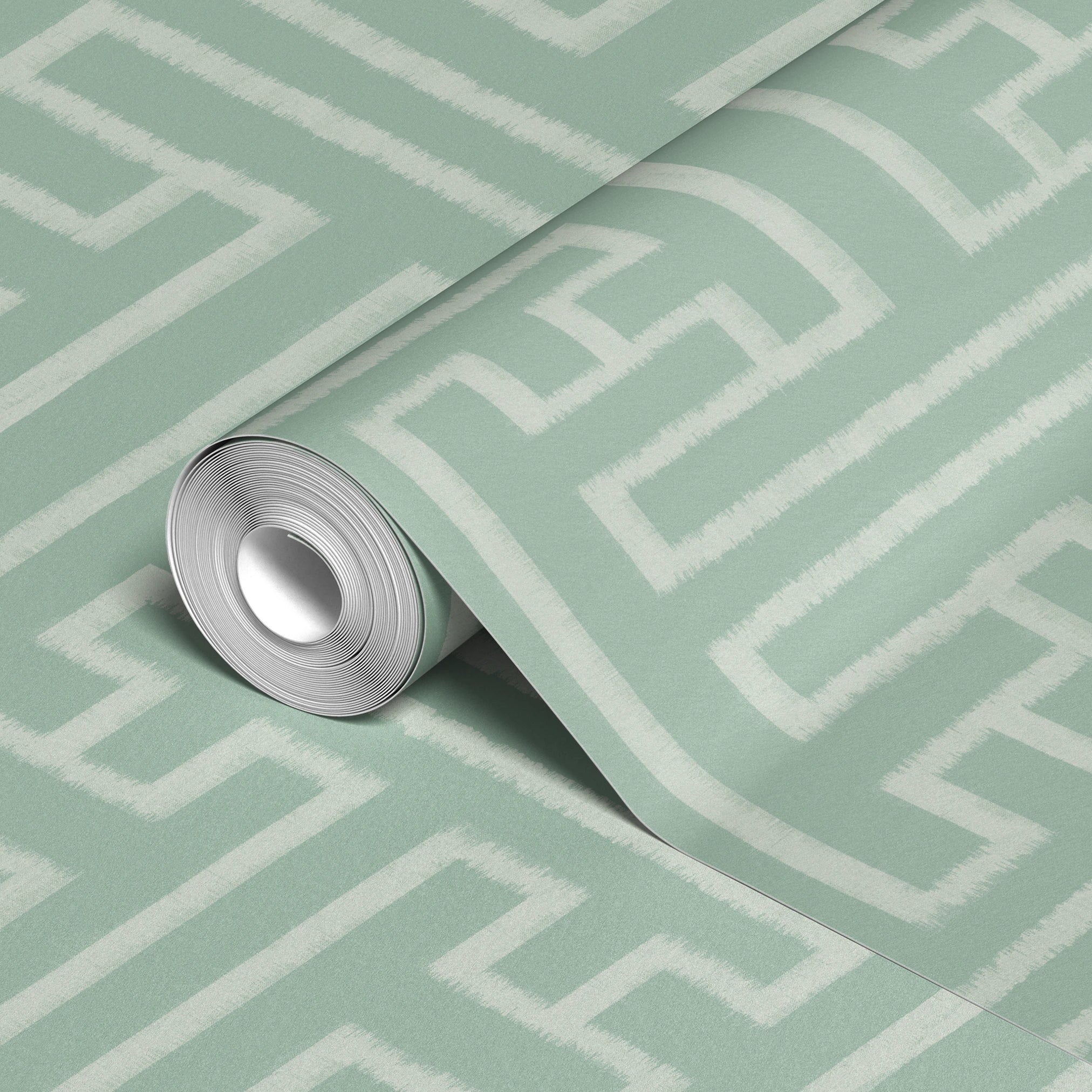 Greek key pattern in sage green and cream with geometric interlocking maze design