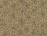 A close-up of a fabric or wallpaper archive featuring a repeating dark gray spiderweb design on a warm mustard yellow background.